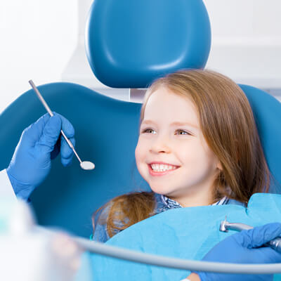girl-showing-dentist-her-smile-sq