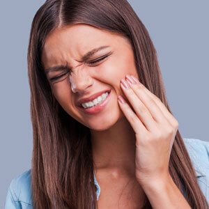 woman-grimacing-with-jaw-pain-sq-300